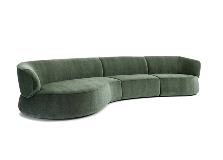 Grünes Sofa in organischen Formen