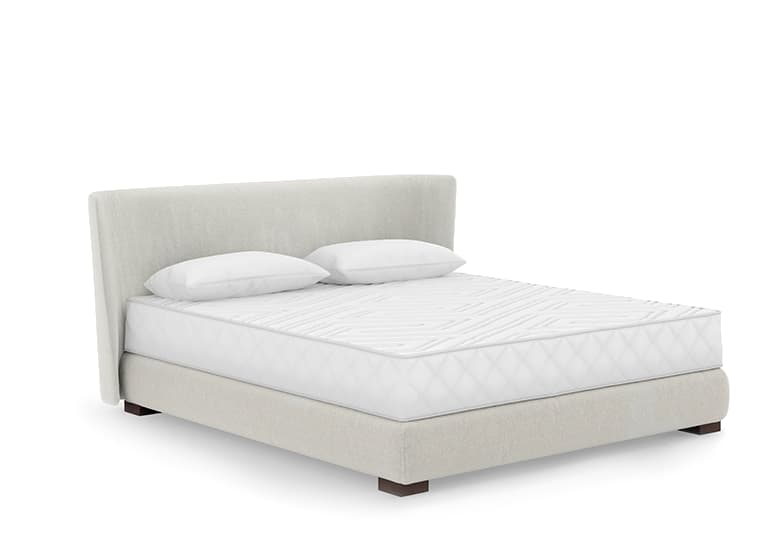 Freisteller eines bodennahen Boxspringbetts in weiß