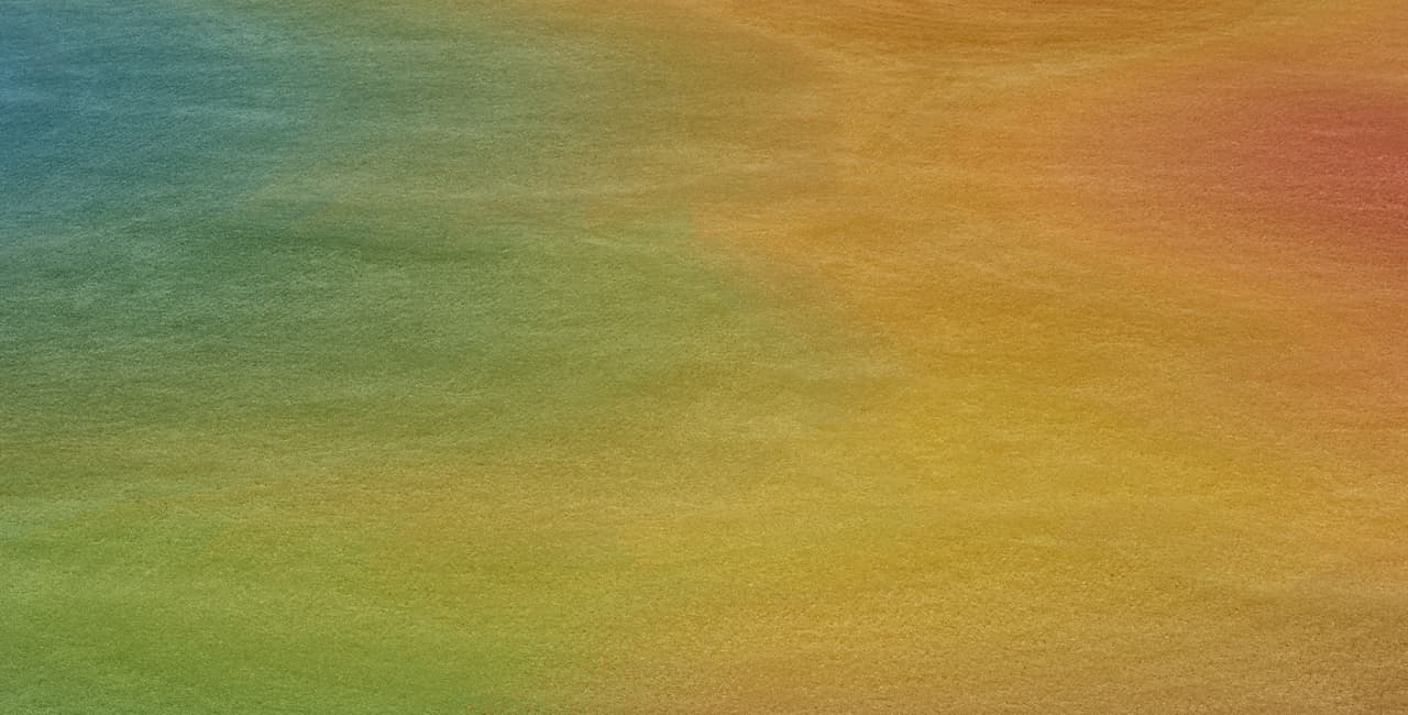 Teppich Multiple Rainbow, bei dem mehrere Regenbogenfarben ineinander verschwimmen